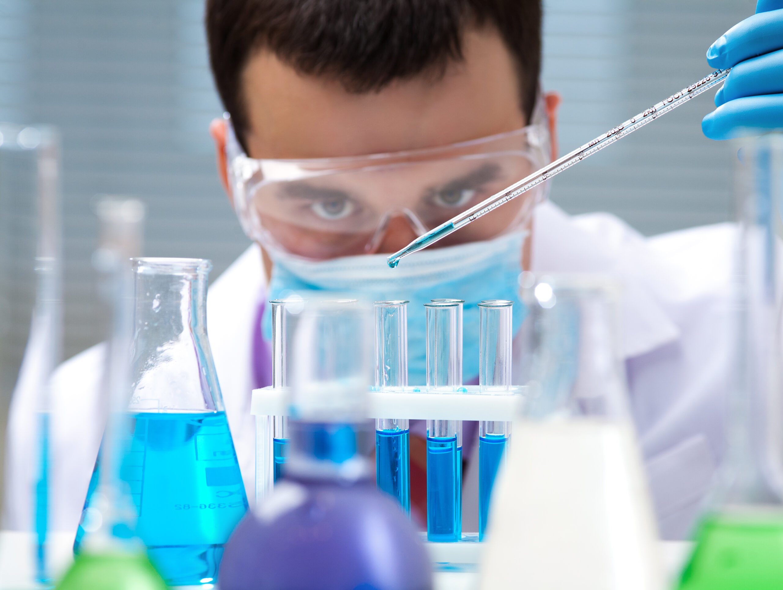 A scientist is conducting experiments involving the combination of various chemicals