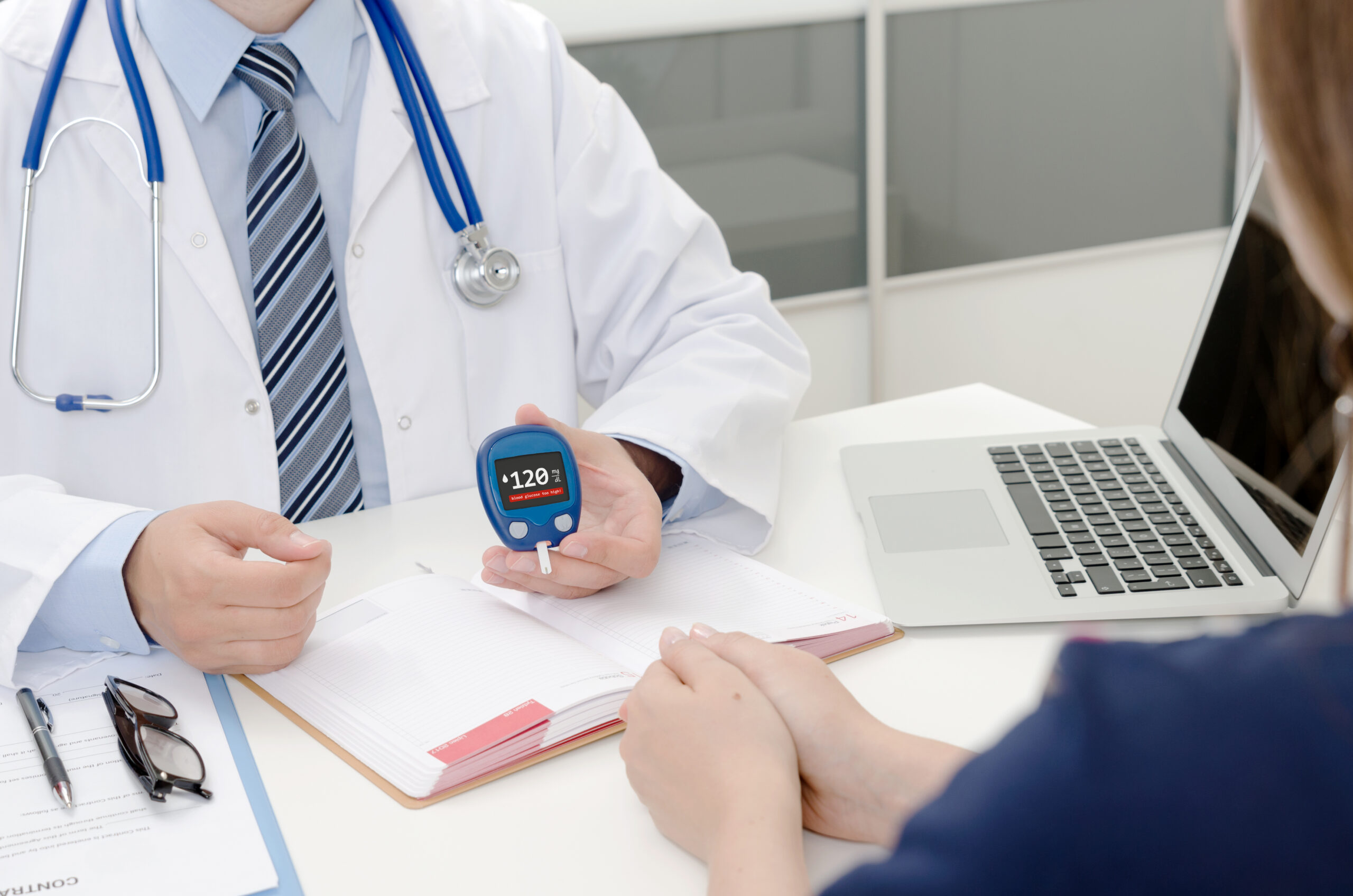 doctor shows the glucometer patient chronic diseases