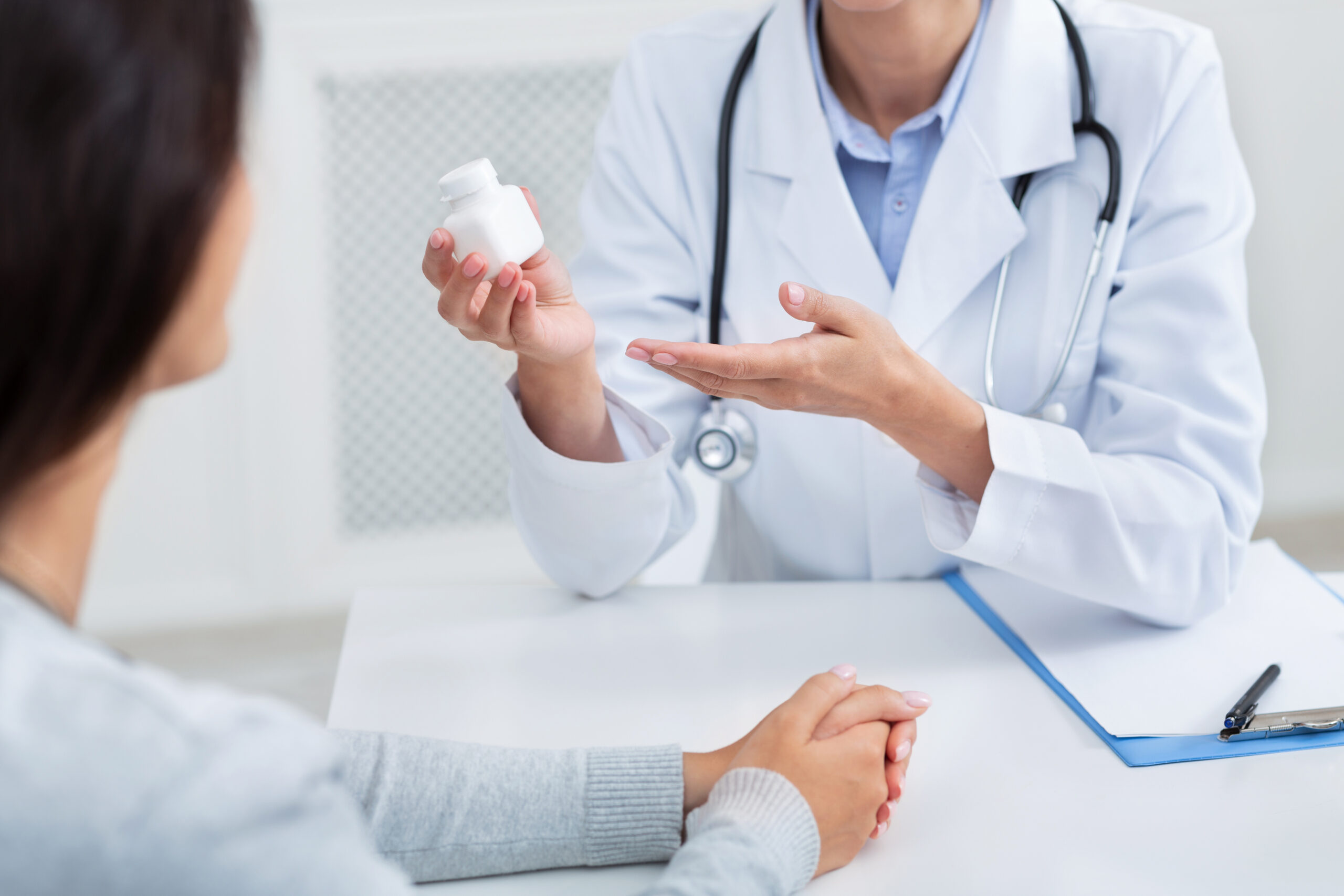 Doctor Giving Instructions to patient  on her medication Treatment 