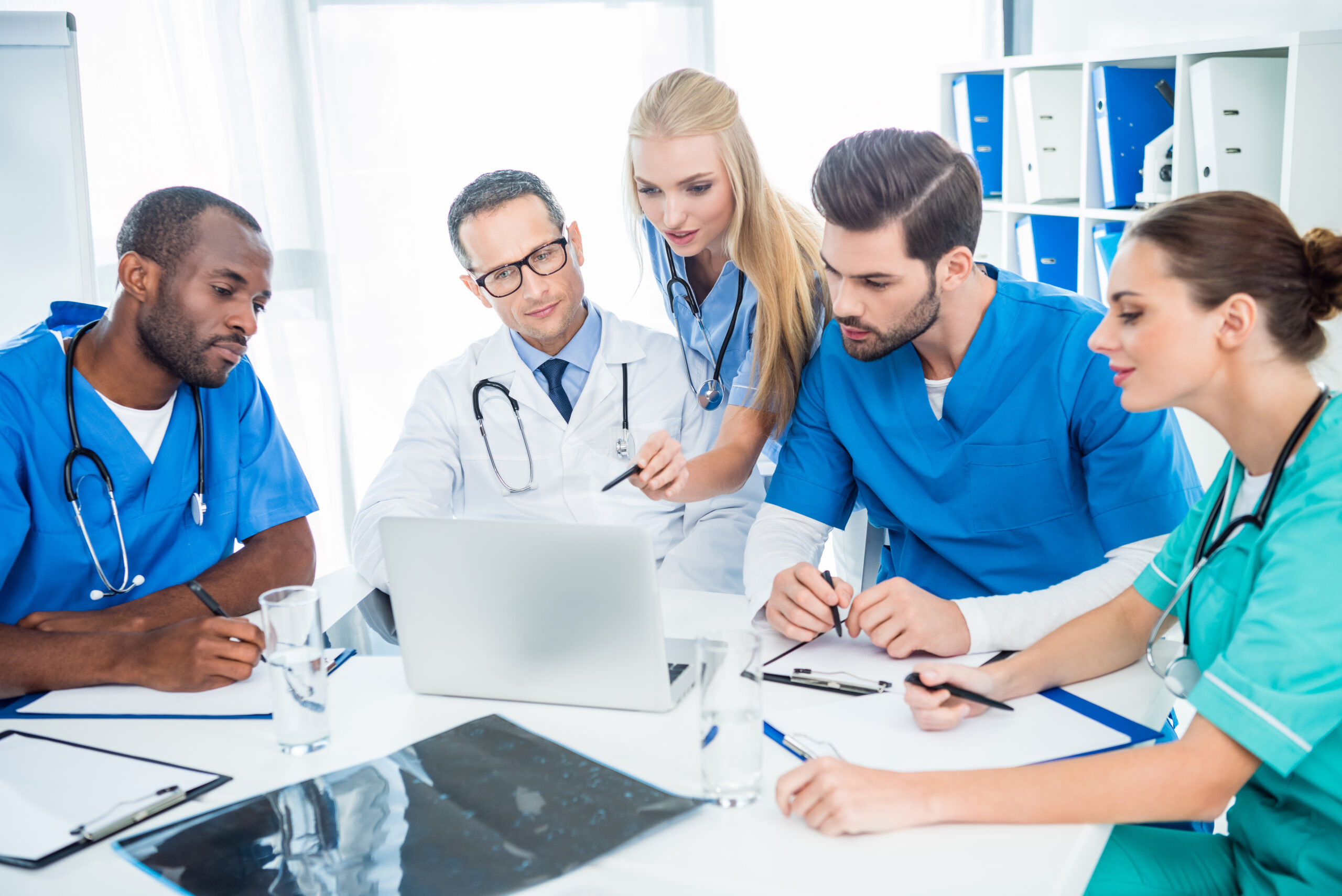Physicians and clinicians are engaged in the examination and analysis of the patient's diagnosis