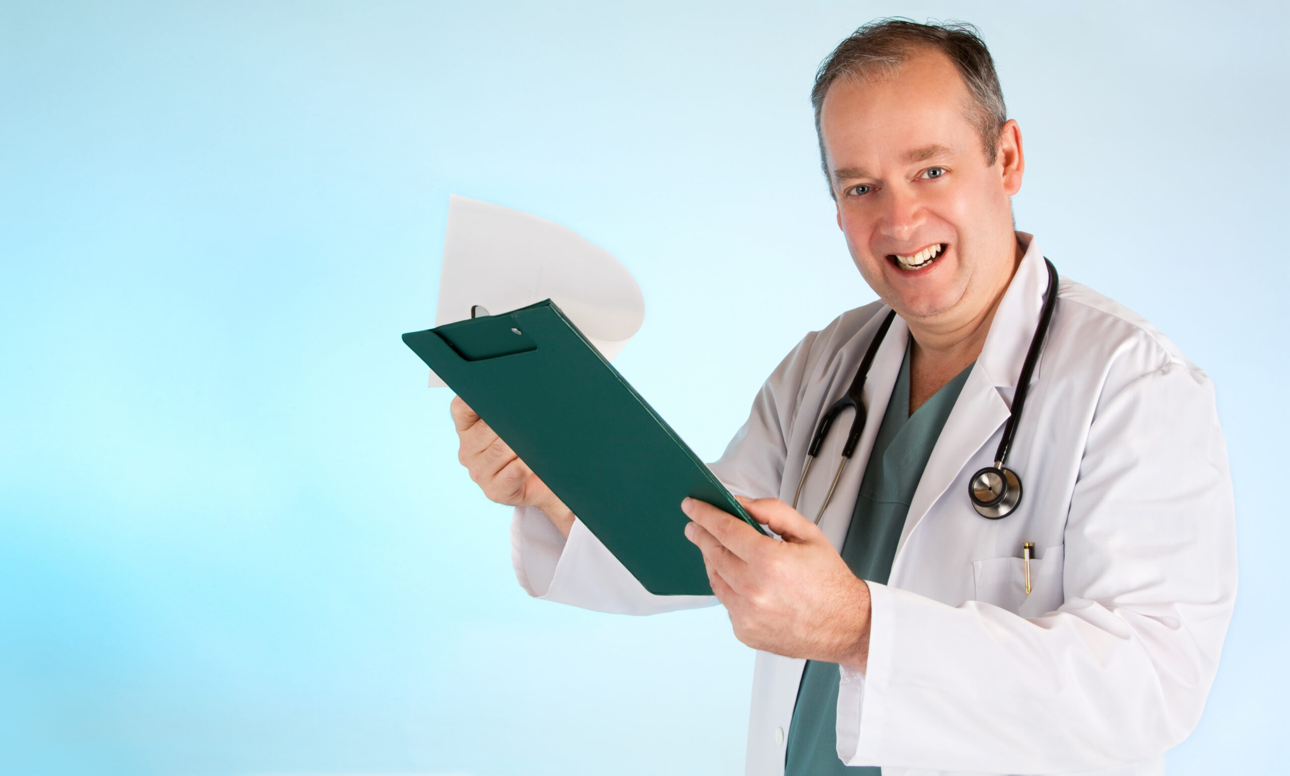 doctor holding a clip board for health assessment