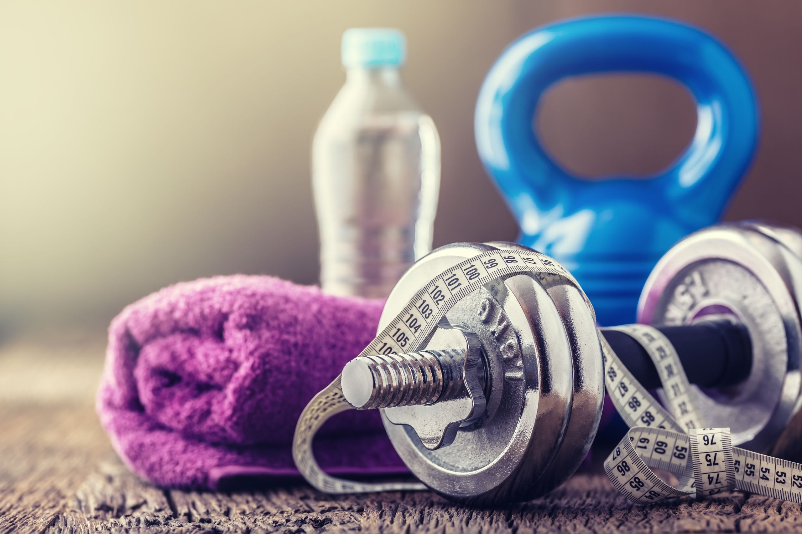 fitness equipment kettlebell dumbbells towel water